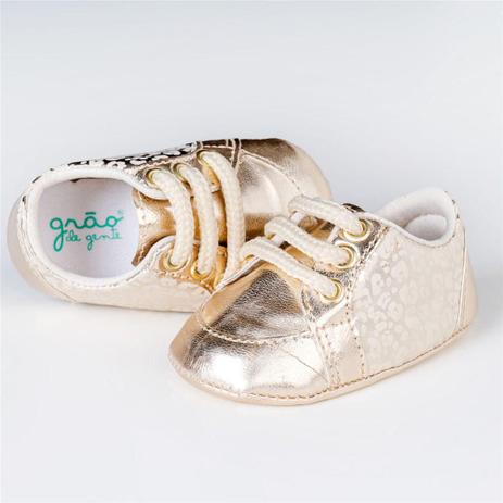 tenis dourado bebe