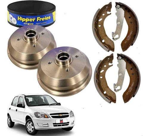 2 Tambores Freio Hipperfreios + 4 Lonas Sapatas Mazzicar Chevrolet Celta 2007 2008 2009 2010 2011 2012... - Hipper Freios + Mazzicar Imagem de 2 Tambores Freio Hipperfreios + 4 Lonas Sapatas Mazzicar Chevrolet Celta 2007 2008 2009 2010 2011 2012...