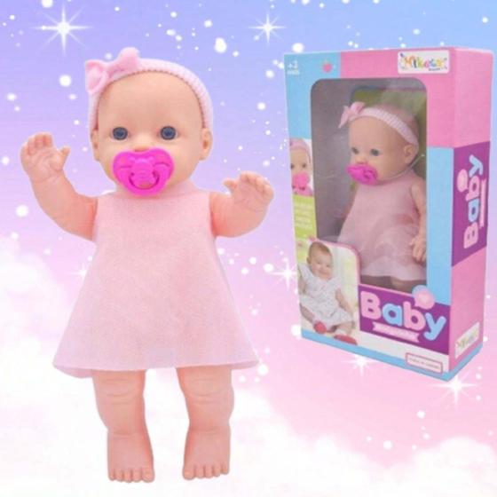 Imagem de Adorável Bebê De Pelúcia Com Lacinho E Vestido Rosa Ideal Para Presente Com Garantia