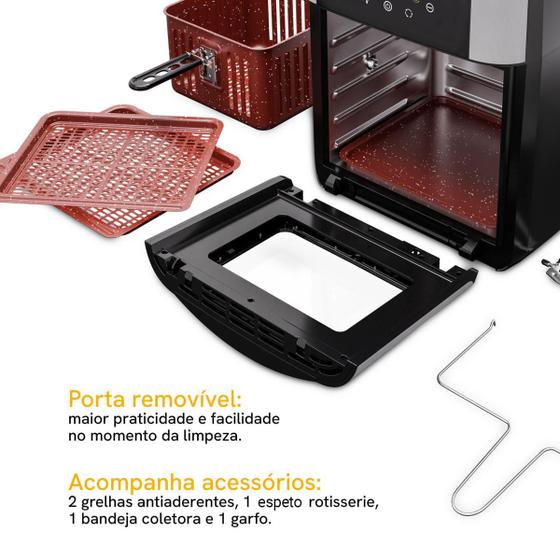 Vista interna da Air Fryer com porta aberta mostrando acessórios e bandeja