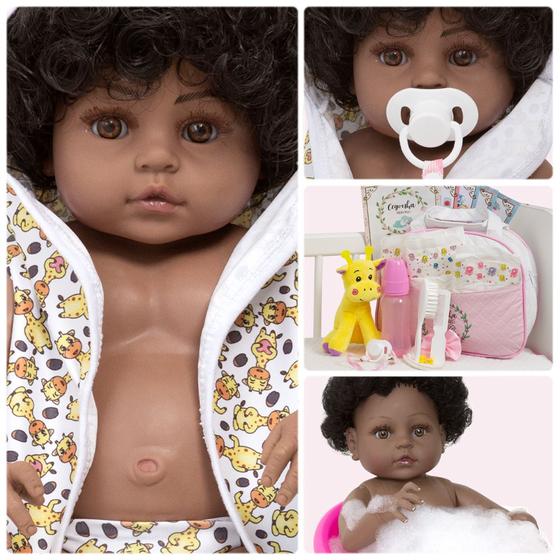 Imagem de Bebe Reborn Menina Negra Cabelo Cacheado Girafinha Com Bolsa