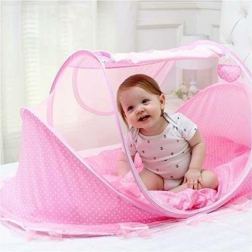 Imagem de Berço Portátil Rosa com Mosquiteiro Ideal para Bebês Dobrável, Compacto e Seguro para Viagens