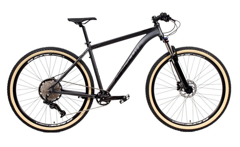 Bicicleta Aro 29 Absolute Nero 4 12v Garfo com Trava K7 11/50 Freios Hidráulicos Kit 1x12 Pneu com Faixa Bege - Grafite Imagem de Bicicleta Aro 29 Absolute Nero 4 12v Garfo com Trava K7 11/50 Freios Hidráulicos Kit 1x12 Pneu com Faixa Bege - Grafite