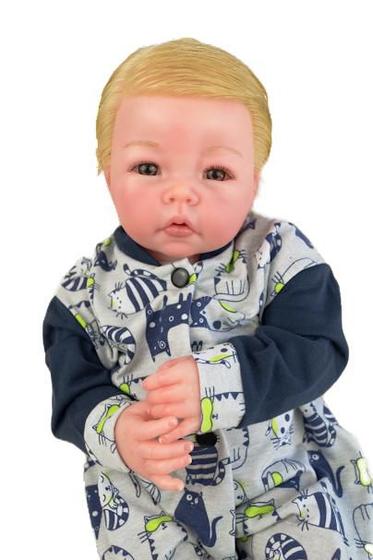 Imagem de Boneca bebê reborn menino fofo com mamadeira e chupeta
