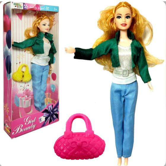 Imagem de Boneca de plástico tipo barbie de brinquedo com roupas e acessórios