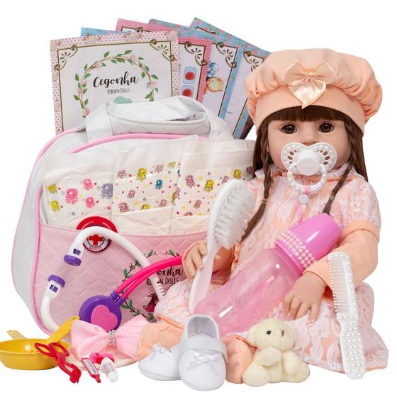 Imagem de Boneca Menina Estilo Reborn Vestido Salmão Bolsa Maternidade