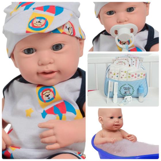 Imagem de Boneco Reborn Bebê 43cm Roupa Aviãozinho Com Bolsa e Itens