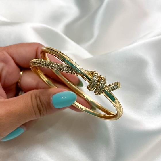 Imagem de Bracelete festa aro liso e cravejado detalhe torcido banhado a ouro 18k