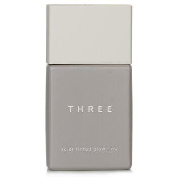 Imagem de Brilho Labial THREE Solar Tinted Glow Flow 04 - Efeito Iluminador