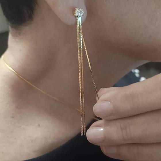 Imagem de Brinco franjado com zircônia  com 8,5 cm de comprimento. Banhado a ouro 18 k