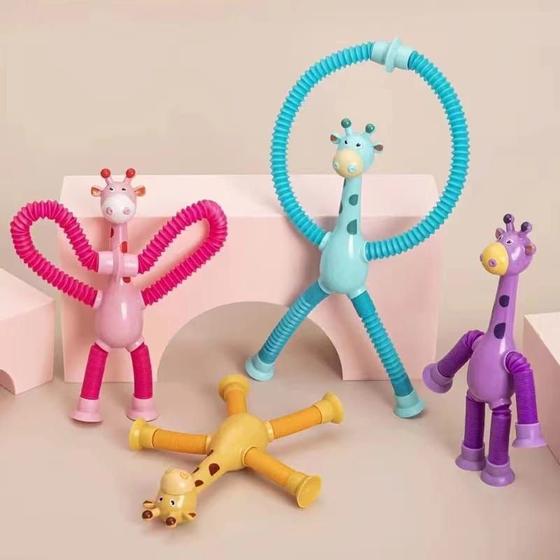 Imagem de Brinquedo girafa estica e puxa com ventosa