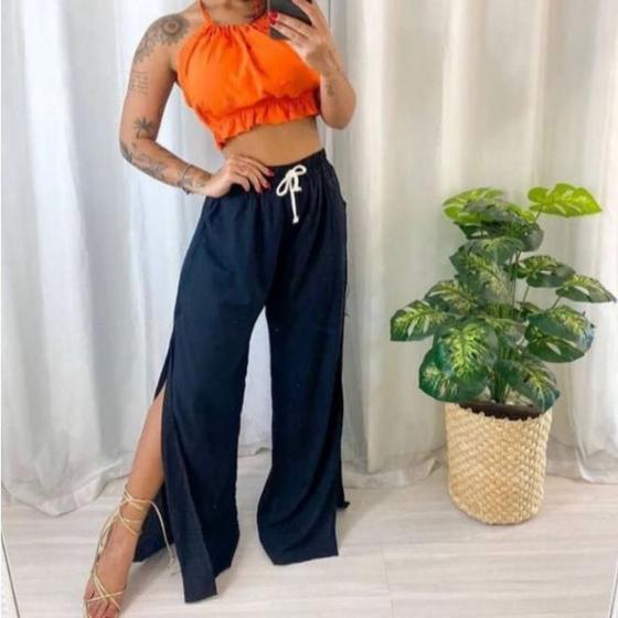 Imagem de Calça feminina pantalona fenda nas pernas tendencia