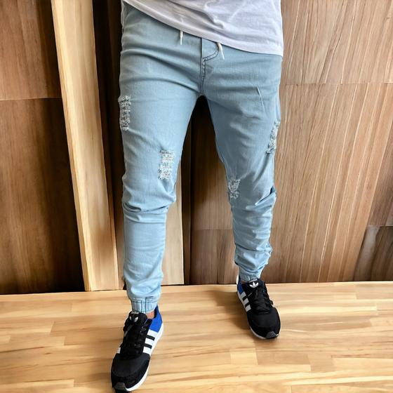 Imagem de calça jeans jogger masculina jeans rasgado, sarja com elastico e bolso