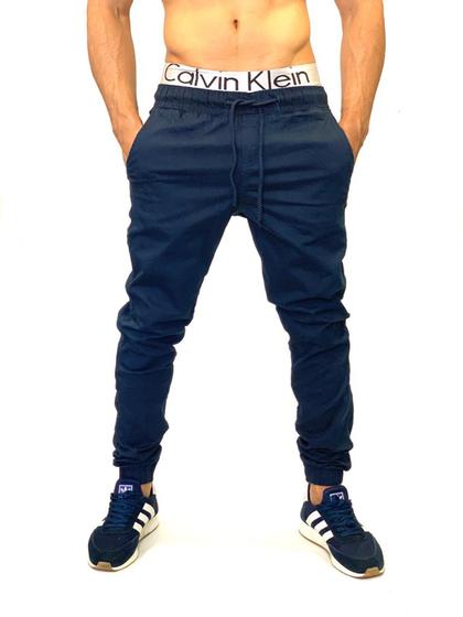 Imagem de CALÇA jeans MASCULINA JOGGER EM SARJA E JEANS SLIM ESTILO DESTROYED CALÇA COM ELASTICO