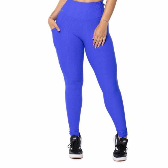 Imagem de Calça Legging Poliamida com textura relevo bolso em uma lateral