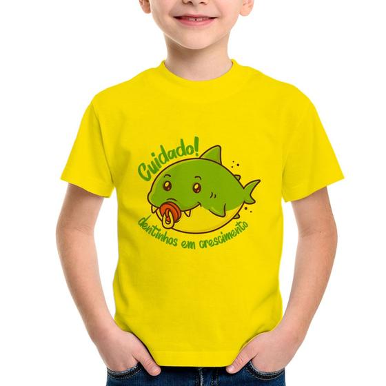 Imagem de Camiseta Infantil Cuidado! Dentinhos em crescimento (Azul) - Foca na Moda