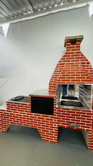 Imagem de Churrasqueira forno e fogão a lenha