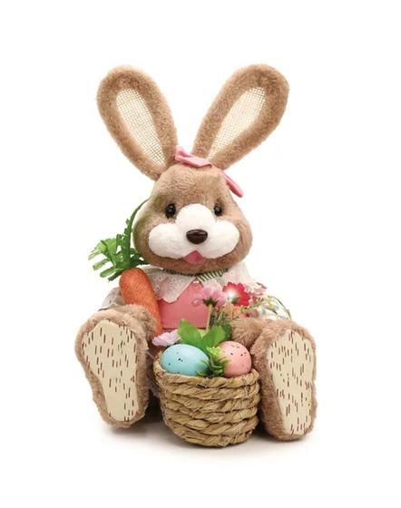 Imagem de Coelha sentada c/cenoura cesto de ovos e flores happy sunday