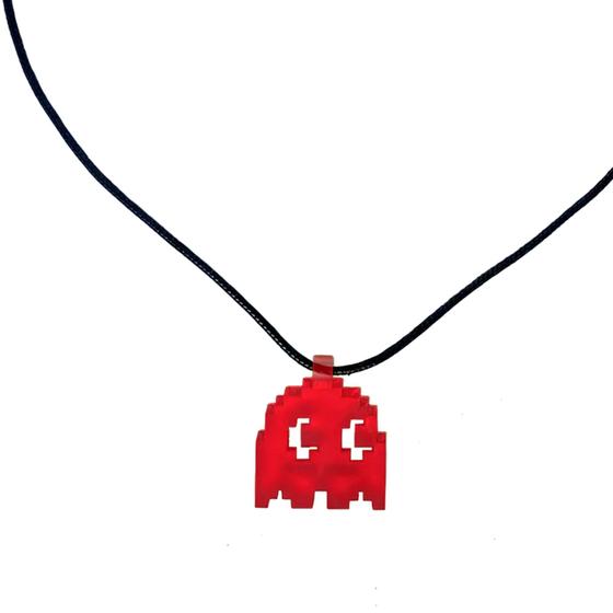 Imagem de Colar Geek Pac Man, com cordão de borracha de 60cm e fecho metálico. Pingente colorido em resina.