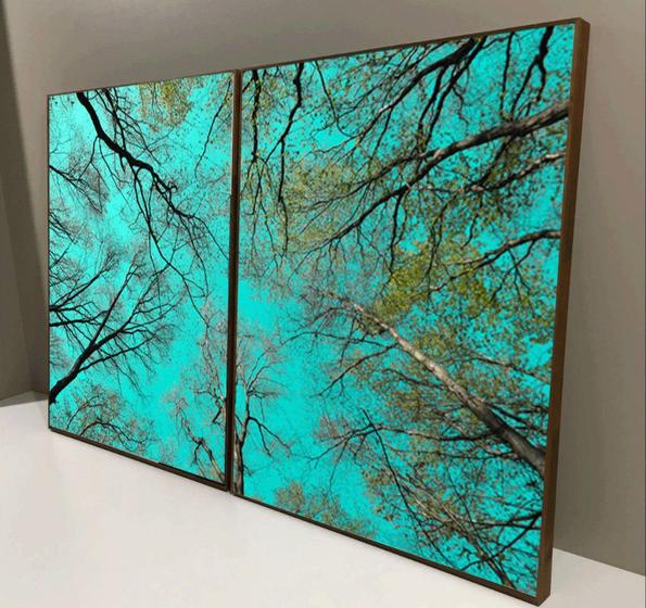 Imagem de Conjunto com 2 quadros decorativos Galhos de árvore com fundo azul.
