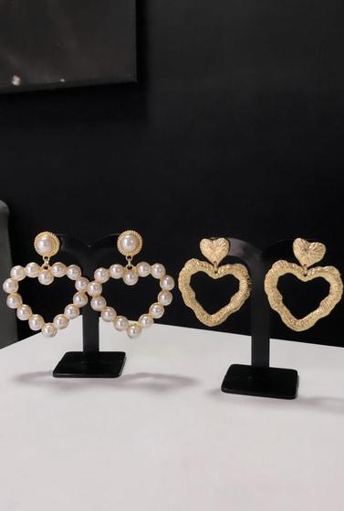 Imagem de Conjunto de brinco estilo coração com perolas.