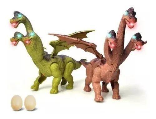 Imagem de Dinossauro C/ 3 Cabeças E Asas Bota Ovo E Anda C Som E Luzes - DM TOYS