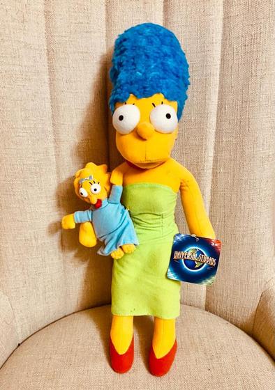 Imagem de elúcia marge e maggie simpson universal studios