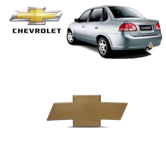 Imagem de Emblema do Porta Mala Gravata GM Corsa Sedan Dourado Adesivo