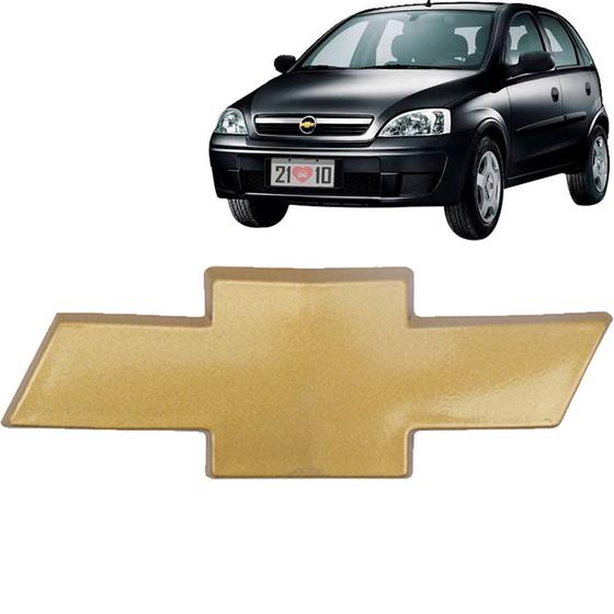 Imagem de Emblema Gravata Dourada Da Grade Corsa Hatch Sedan Montana 02/12