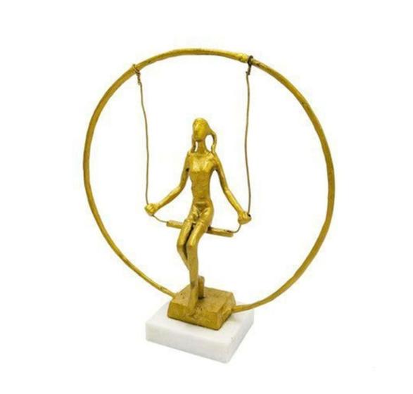 Imagem de Escultura Decorativa Criança Balançando Dourado Luxo