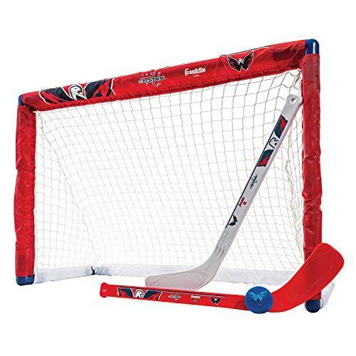 Imagem de Franklin Sports Washington Capitals Mini Hockey Set - Gol de Hóquei no Joelho, Bola e 2 Conjuntos de Combos de Tacos de Hóquei - Mini Rede de Gols - Conjunto Oficial de Hóquei da NHL