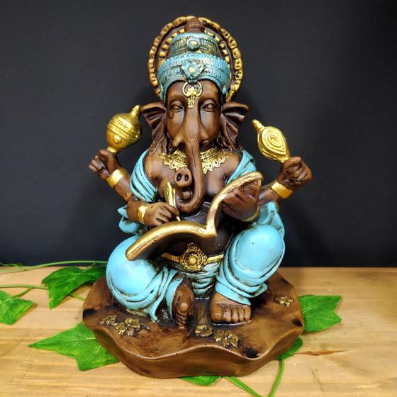Imagem de Ganesha com livro envelhecida com azul 25cm