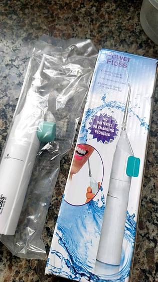 Imagem de Jato De Agua Limpeza Oral Dental Bucal Irrigador