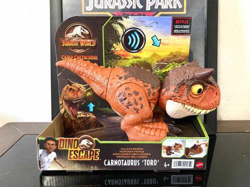 Imagem de Jurassic World Carnotaurus Toro 26cm Morde C/ Som C/nf