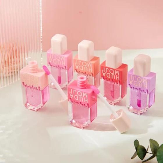 Imagem de Kit 2 unidades de Batom lip gloss glitter formato picolé mudança de cor cheiro doce útil
