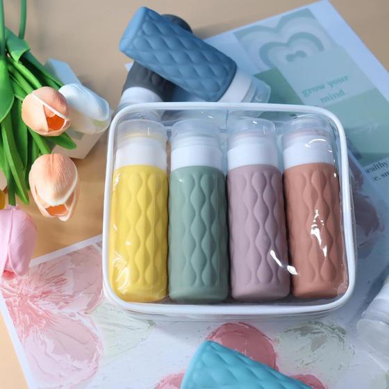Imagem de Kit com 4 Frascos Pote Silicone 100 Ml Creme Shampoo Viajem Necessaire
