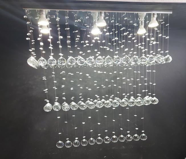 Imagem de Lustre de cristal para sala de estar/jantar com 80cm de altura, base de inox espelhado 70X20cm