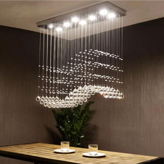 Imagem de Lustre Onda De Cristal Legítimo K9 Para Sala de Jantar Com 70cm de Altura , Base Toda Feita em Aço Inox Espelhado