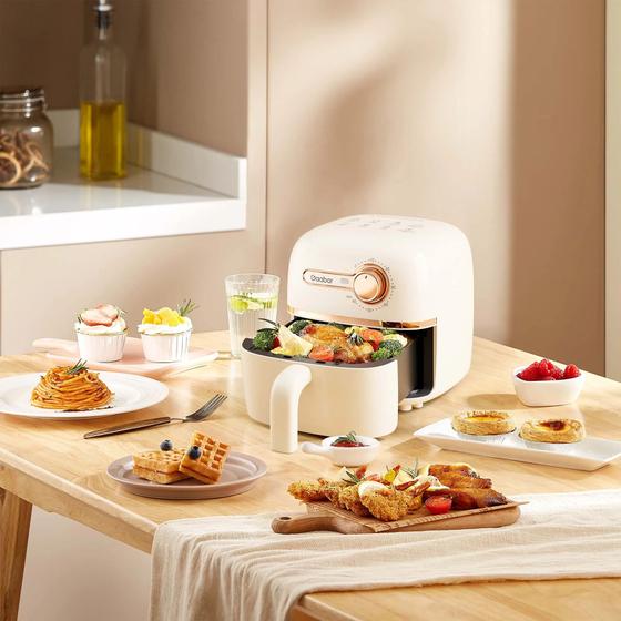**Mini Air Fryer Gaabor**: prepare receitas deliciosas com mais praticidade, economia e menos óleo! Compacta, moderna e eficiente, ela é perfeita para cozinhas pequenas e para quem busca refeições crocantes e saborosas em poucos minutos. Descubra todas as vantagens e veja por que a Mini Air Fryer Gaabor está conquistando cada vez mais consumidores. 🍟✨
