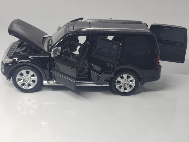 Imagem de Miniatura carro mitsubishi pajero 1:32 abre 4 portas capo e malas acende farol