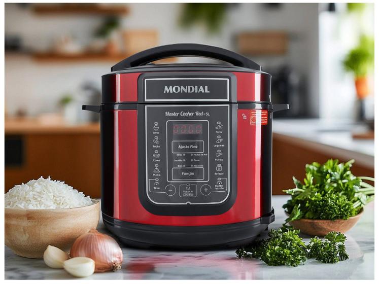 Panela de pressão elétrica posicionada em uma cozinha com ingredientes frescos ao redor