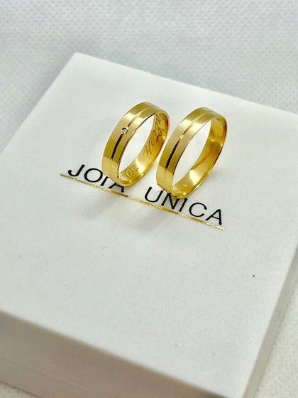 Imagem de Par de Aliancas Ouro 18 K com 3,5mm, 1 diamante na feminina