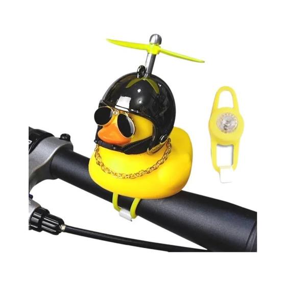 Imagem de Pato Amarelo Sino De Bicicleta Dos Desenhos Animados Pequenos Patos Capacete Cabeça Luz Brilhante