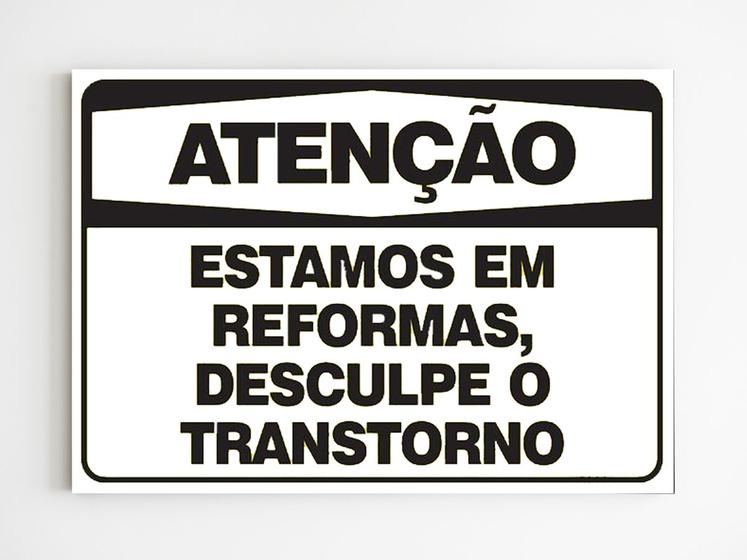 Imagem de Placa de aviso estamos em reformas desculpe o transtorno