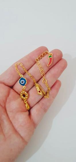 Imagem de Pulseira com pingente Patua olho grego e pedrinhas Zirconias banhado ouro18k