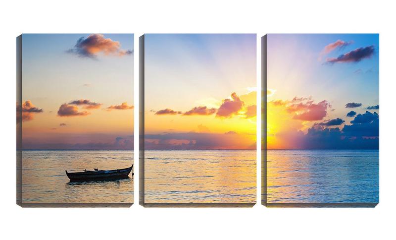 Imagem de Quadro canvas 30x66 canoa no mar e pôr do sol