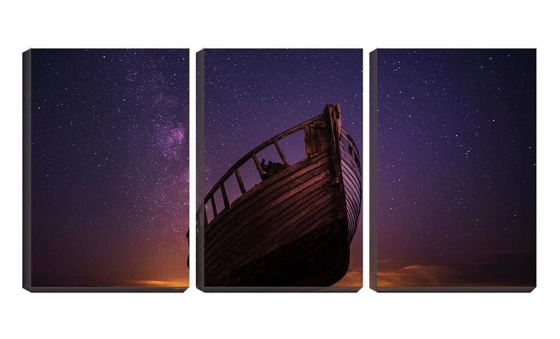 Imagem de Quadro Decorativo 55x110 carcaça de barco sob estrelas