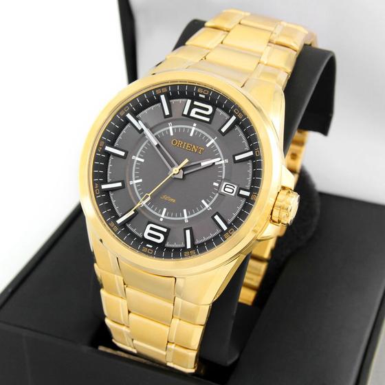 Imagem de Relogio orient masculino dourado fundo preto mgss1141 g2kx