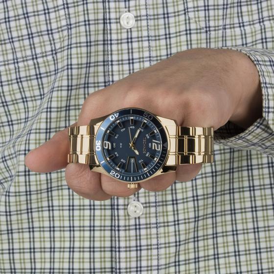 Imagem de Relogio technos masculino dourado com fundo azul 2115LAJS/4A original