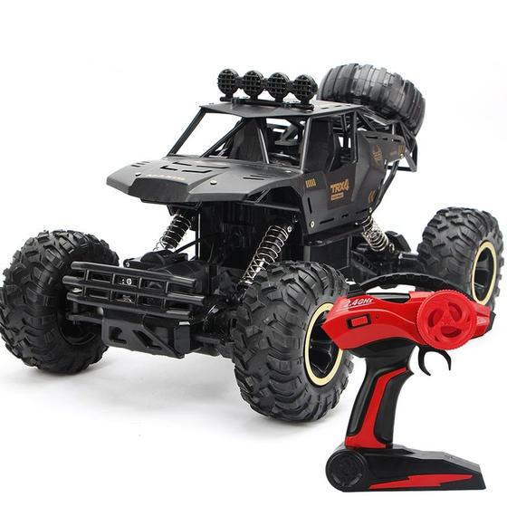 Imagem de Veículo off-road RC Car Wokex 4WD 2,4 GHz subindo em escala 1:12